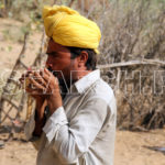 A Hindu blowing in temple, Chachro, Thar, Sindh, December 27, 2012