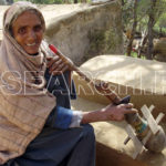 A woman enjoying free moments, Haripur, KP, August 17, 2009