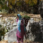 A woman taking rest, Kareemabad, Hunza, Gilgit-Baltistan, November 7, 2016