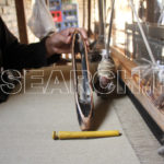 A worker preparing his machine, Charsadda, KP, February 24, 2013