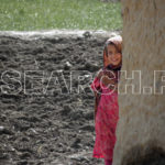 An Afghan girl looking through, Qila Saif Ullah, Balochistan, January 30, 2011