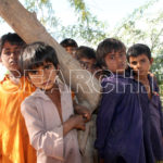 Boys gathered around a tree, Chachro, Thar, Sindh, December 29, 2015