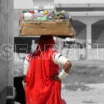 Woman selling in streets, Badin, Sindh, March 30, 2012