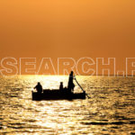 Boat in stunning sunset light, Karachi, Sindh, December 27, 2013